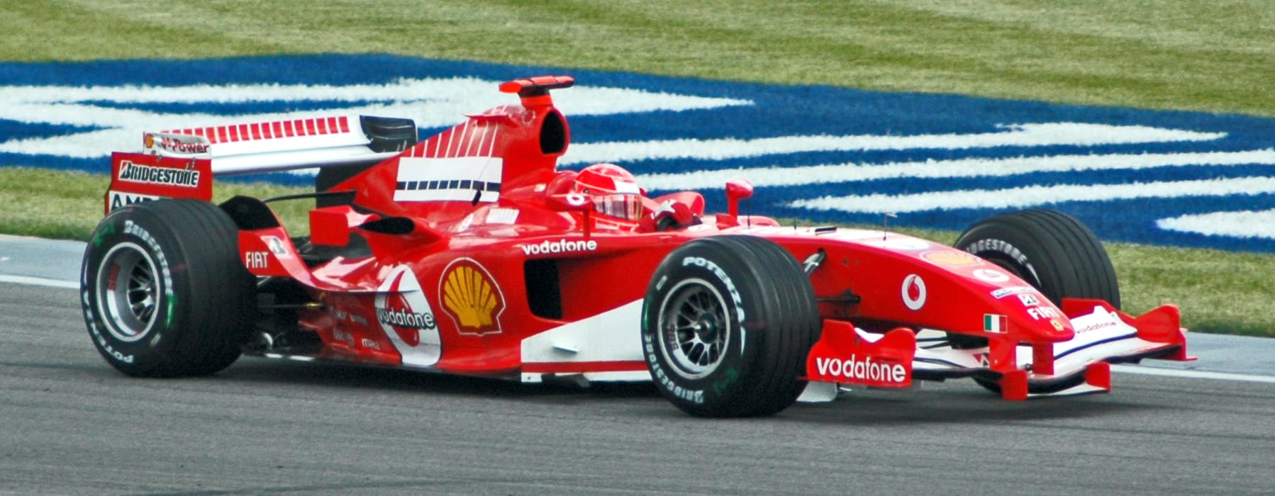 Michael Schumacher driving a Ferrari Formula 1 car during practice at the 2005 United States Grand Prix